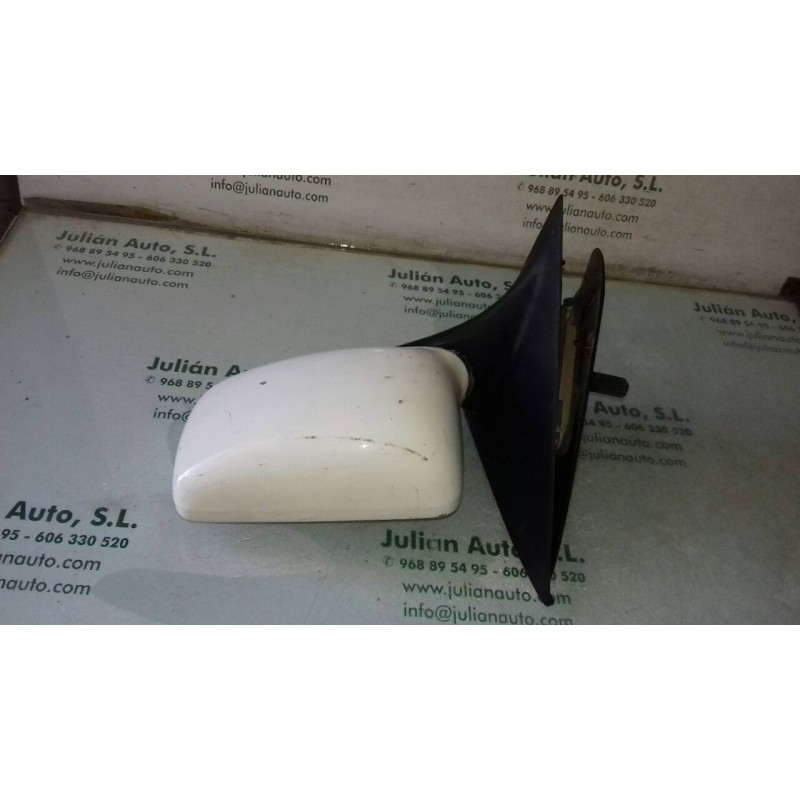 Recambio de retrovisor izquierdo para ford escort berlina ghia referencia OEM IAM 91ABA23409  MANUAL