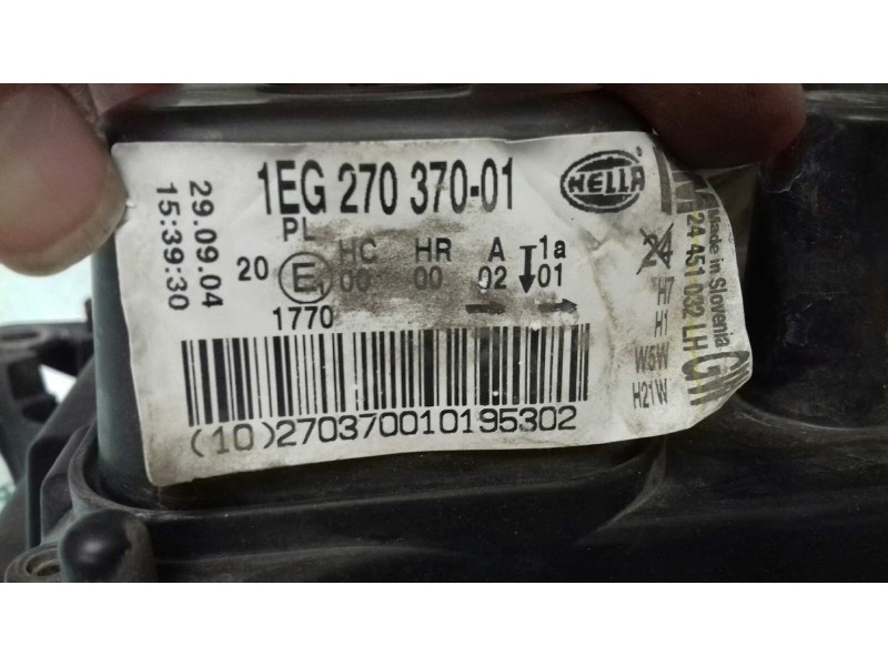 Recambio de faro izquierdo para opel astra h berlina cosmo referencia OEM IAM 1EG27037001 HELLA 