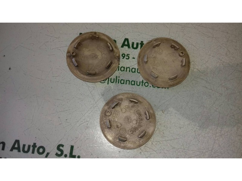 Recambio de tapacubos para ford fiesta berlina (dx) ghia referencia OEM IAM 97BG1000AC  3 TAPACUBOS
