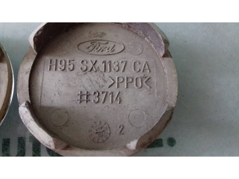 Recambio de tapacubos para ford mondeo berlina (gd) ghia referencia OEM IAM H95SX1137CA  2 UNIDADES