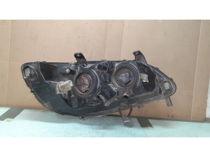 Recambio de faro izquierdo para opel zafira a blue line referencia OEM IAM 89100054  