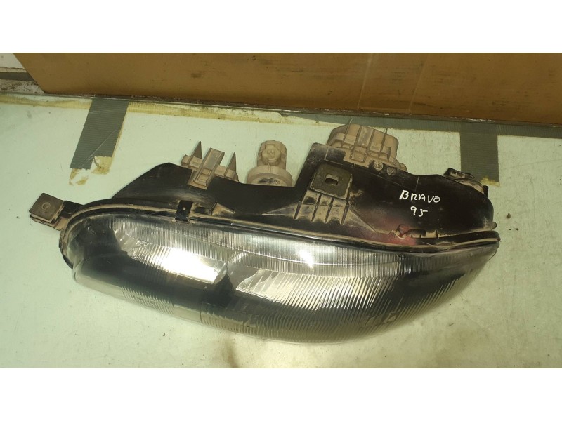 Recambio de faro izquierdo para fiat bravo (182) 1.8 16v / 16v 115 gt referencia OEM IAM 88201557SX A385 