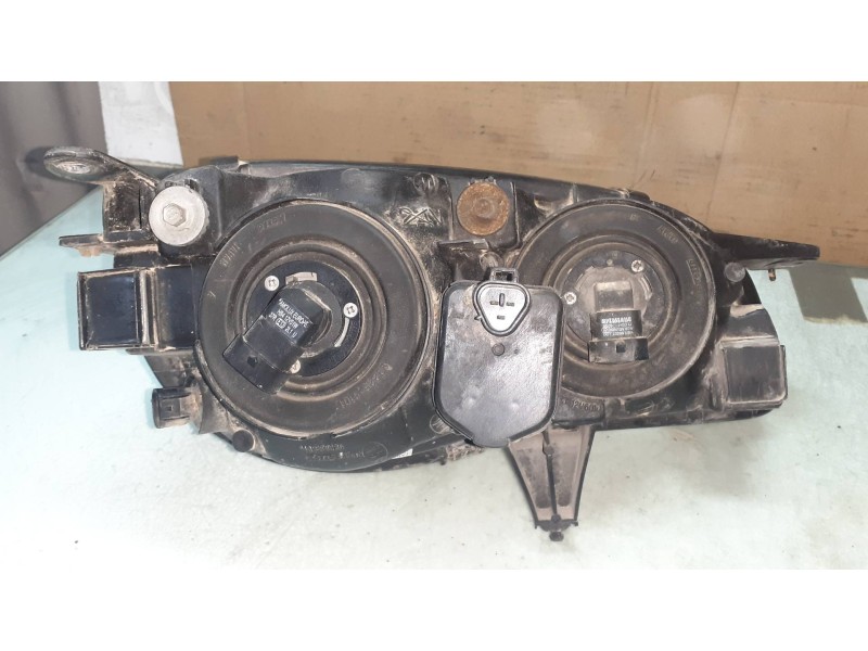 Recambio de faro izquierdo para toyota corolla (e11) 1.4 linea terra (5-ptas.) referencia OEM IAM 10077126 12459 KOITO