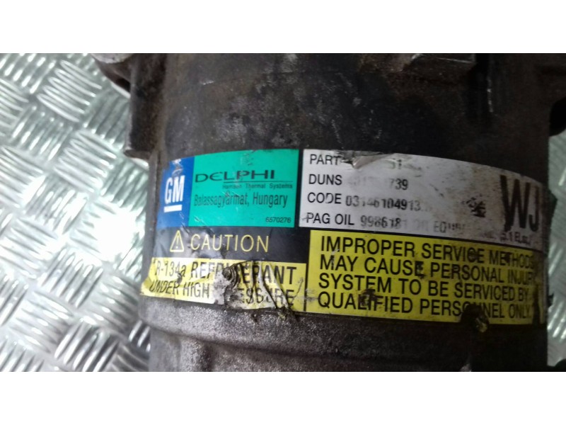 Recambio de compresor aire acondicionado para opel meriva cosmo referencia OEM IAM 6561047  DELPHI