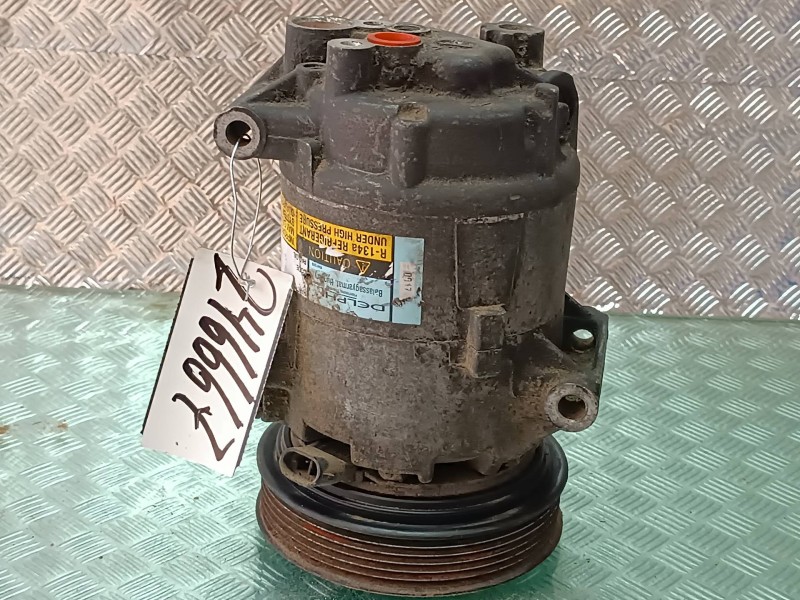 Recambio de compresor aire acondicionado para nissan almera (n16/e) acenta referencia OEM IAM 6561318  DELPHI