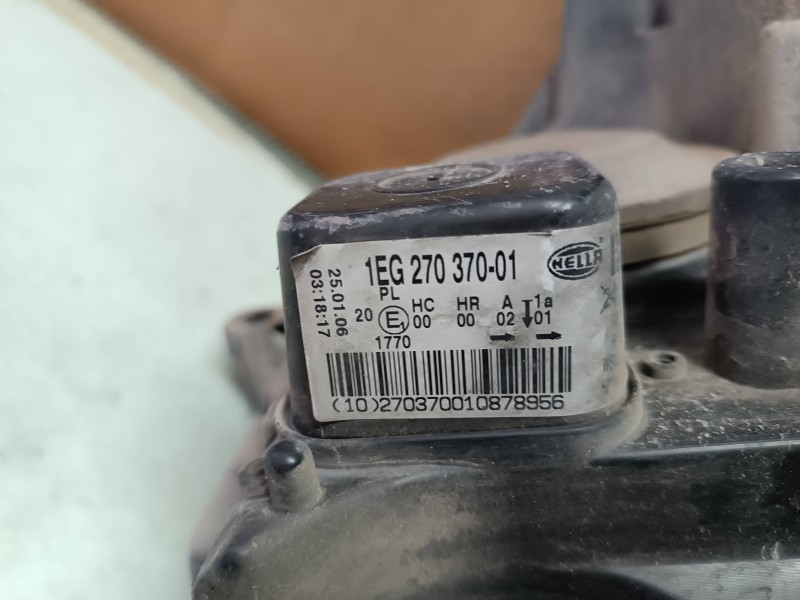 Recambio de faro izquierdo para opel astra h ber. cosmo referencia OEM IAM 1EG27037001  HELLA