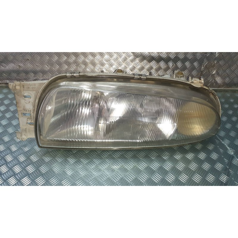 Recambio de faro izquierdo para ford fiesta berlina referencia OEM IAM 0301049201 1305219059 