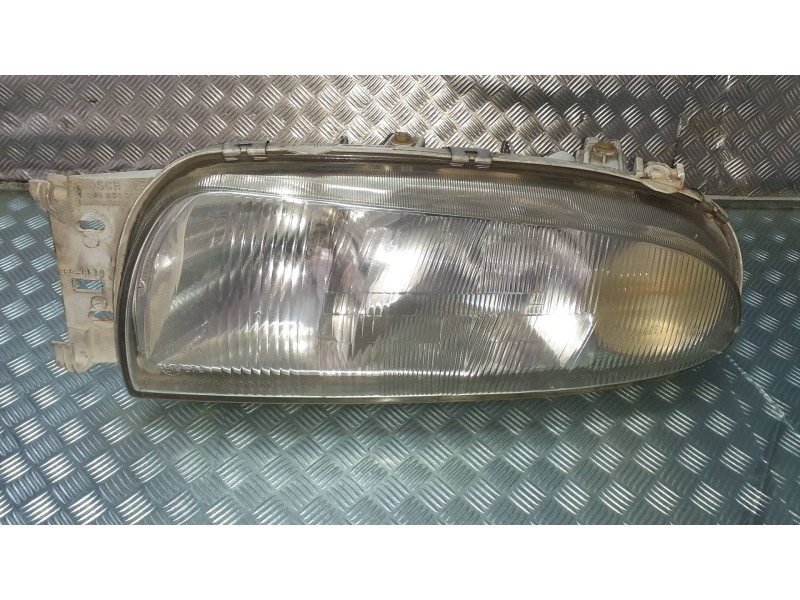 Recambio de faro izquierdo para ford fiesta berlina referencia OEM IAM 0301049201 1305219059 