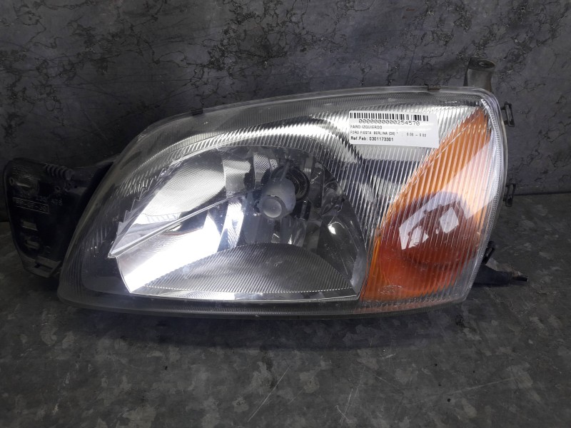 Recambio de faro izquierdo para ford fiesta berlina (dx) referencia OEM IAM 0301173301  
