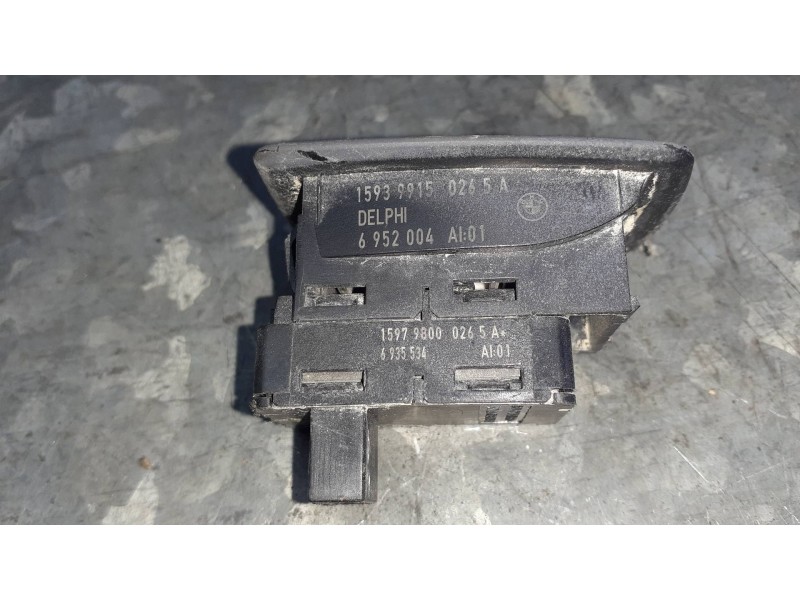 Recambio de mando elevalunas trasero izquierdo para bmw serie 1 berlina (e81/e87) 120d referencia OEM IAM 6952004 15919800 69355