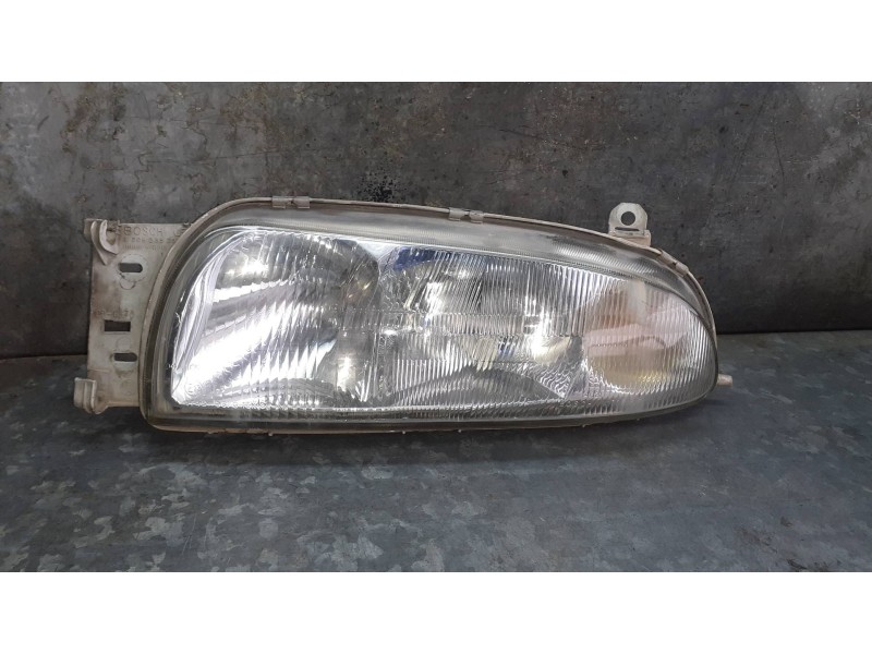 Recambio de faro izquierdo para ford fiesta berlina referencia OEM IAM 96FG13006AG 0301049201 