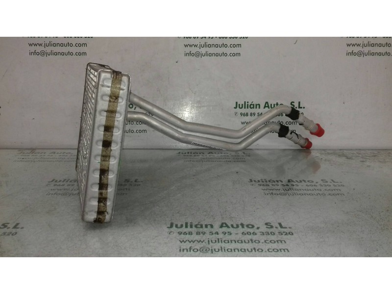 Recambio de radiador calefaccion / aire acondicionado para ford fiesta (cbk) ambiente referencia OEM IAM T2098J24C  