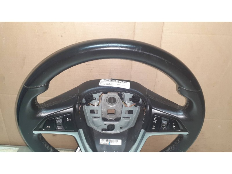 Recambio de volante para opel astra j lim. cosmo referencia OEM IAM 13305818  PIEL